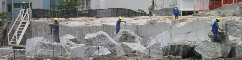 Muro corte e detonações de pedras